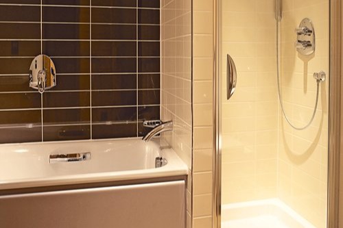Bathroom with tub and shower