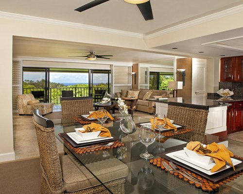 Elegant dining room with private balcony in the background