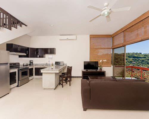 Villas Sol Hotel And Beach Resort Living Area and Kitchen