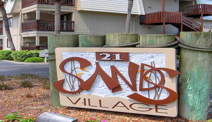 sand village sign