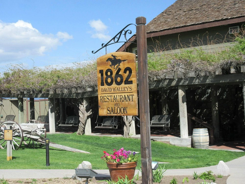 Wooden sign for "1862 David Walley's Restaurant and Saloon" at a rustic Lake Tahoe timeshare.