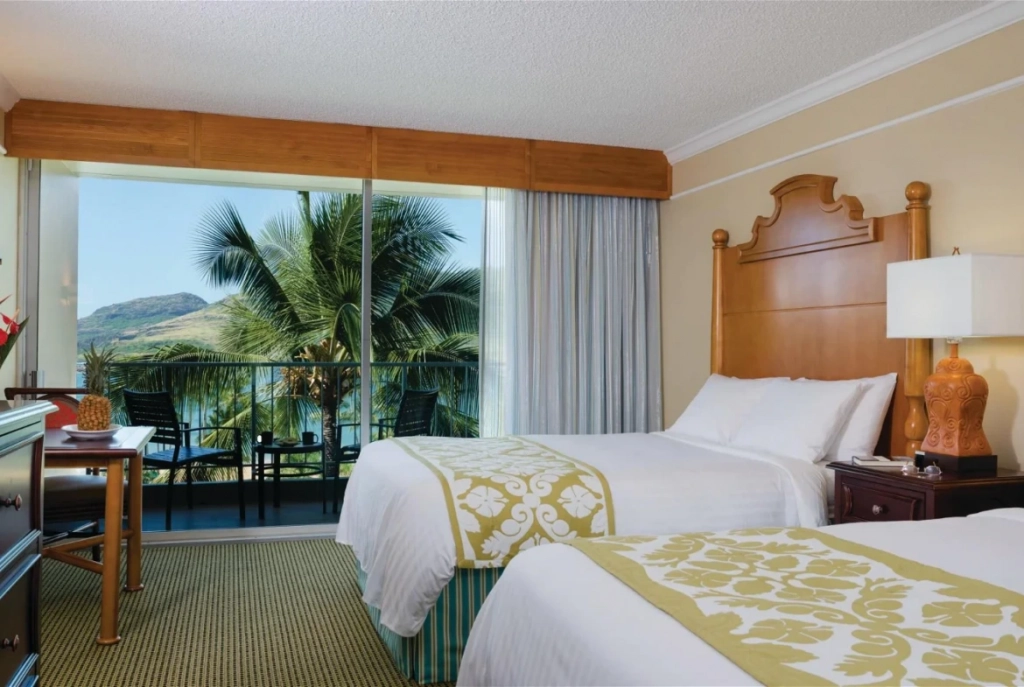 Bedroom With Palm Tree Outside Window
