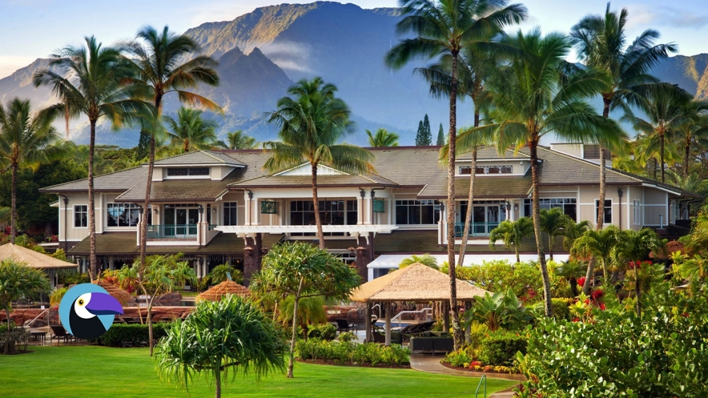 Grand resort building surrounded by lush lawns and mountains, highlighting westin vacation club benefits.