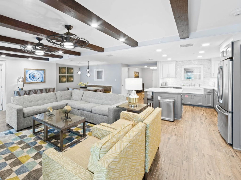 Modern living room and kitchen interior at Holiday Inn Cape Canaveral Beach Resort.
