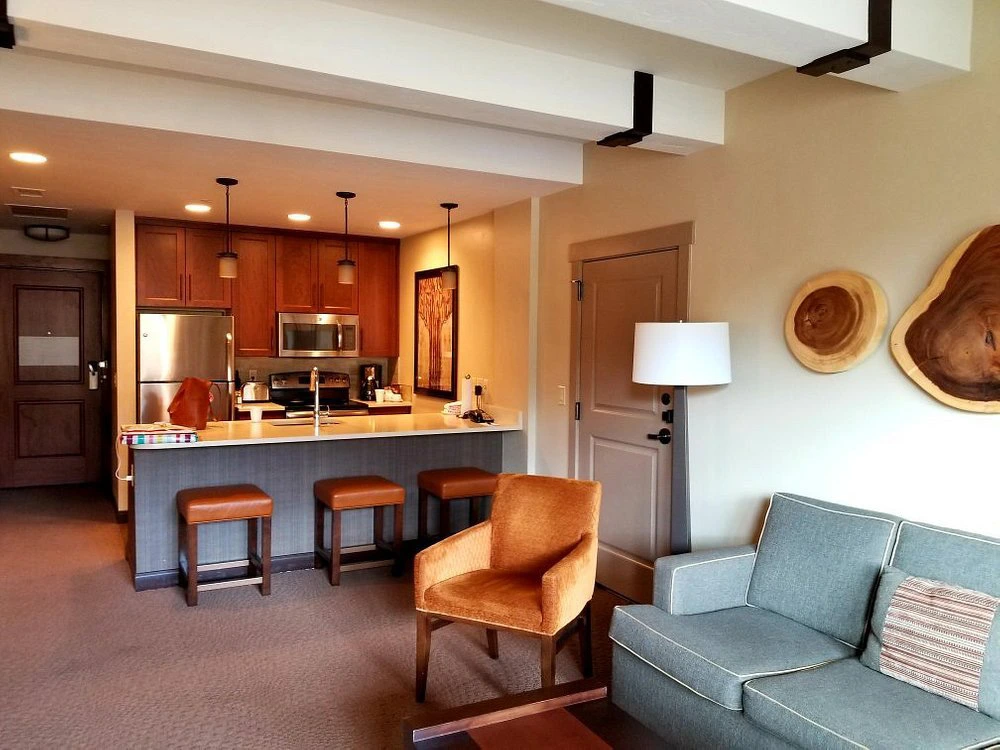 Cozy villa living room and kitchen setup at Sheraton Steamboat Resort Villas.