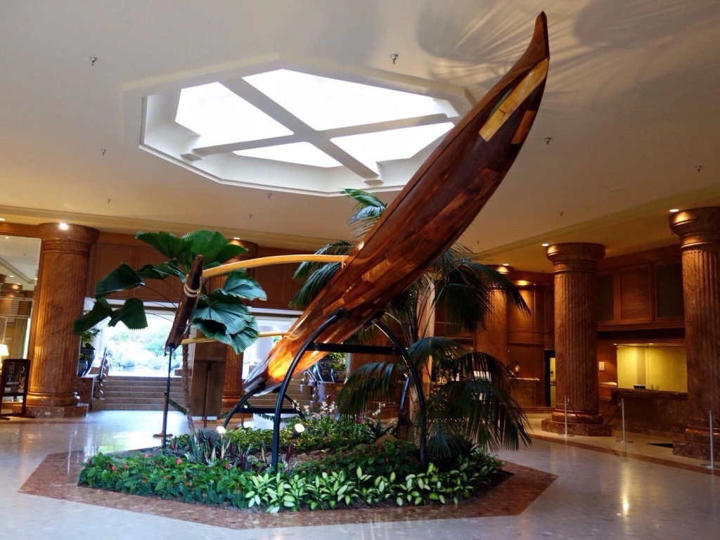 See how does Marriott timeshare work by visiting the Kauai Beach Club lobby, featuring a large outrigger canoe.
