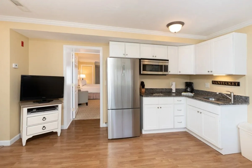 Innseason Captain's Quarters Kitchen and Bedroom
